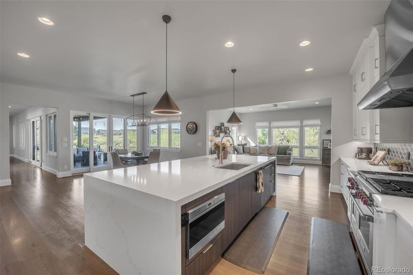 Dining room, Interior, Kitchen, Living room, Pendant Lights, Recessed Lighting, Stainless Steel Appliances, Wood Texture Flooring
