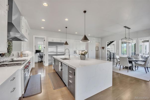 Dining room, Interior, Kitchen, Pendant Lights, Recessed Lighting, Stainless Steel Appliances, Wood Texture Flooring