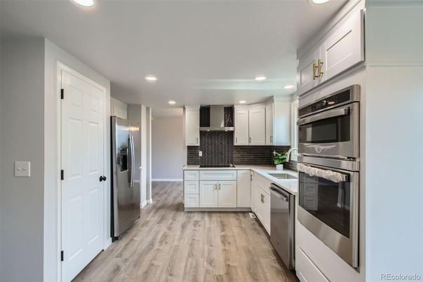 Interior, Kitchen, Recessed Lighting, Stainless Steel Appliances, Wood Texture Flooring