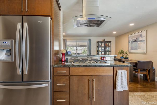 Dining room, Interior, Kitchen, Recessed Lighting, Stainless Steel Appliances, Wood Texture Flooring