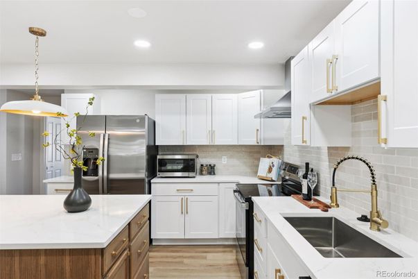 Interior, Kitchen, Pendant Lights, Recessed Lighting, Stainless Steel Appliances, Wood Texture Flooring