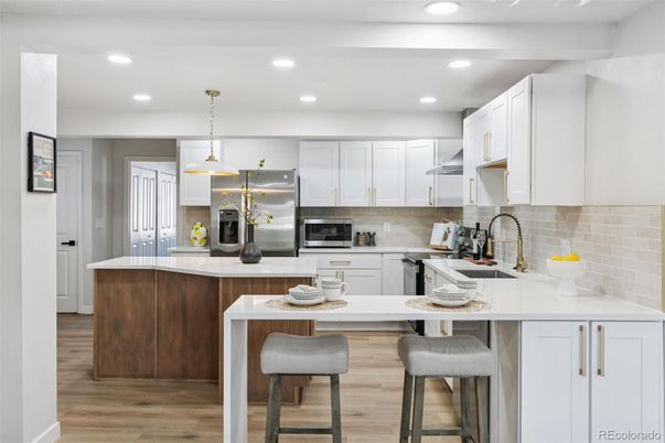 Interior, Kitchen, Pendant Lights, Recessed Lighting, Stainless Steel Appliances, Wood Texture Flooring