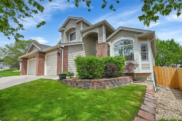 Attached, Exterior, Facade, Brick Facade, American Craftsman