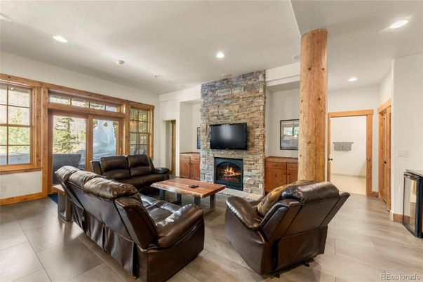 Fireplace, Interior, Living room, Recessed Lighting, Stone Walls