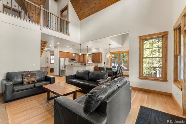 Dining room, Interior, Kitchen, Living room, Pendant Lights, Recessed Lighting, Stainless Steel Appliances, Wooden Ceilings, Wood Texture Flooring