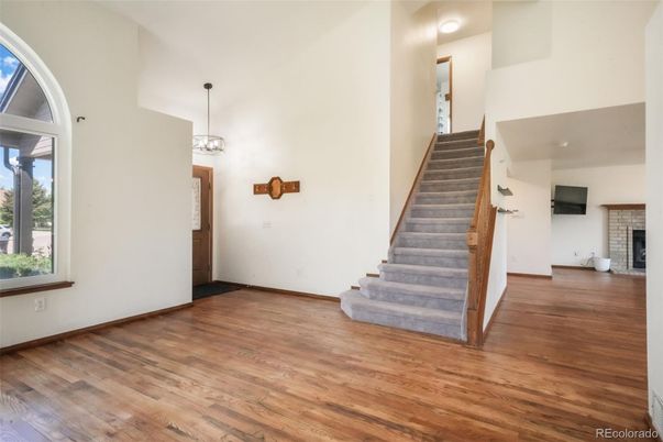 Empty room, Fireplace, Interior, Pendant Lights, Wood Texture Flooring