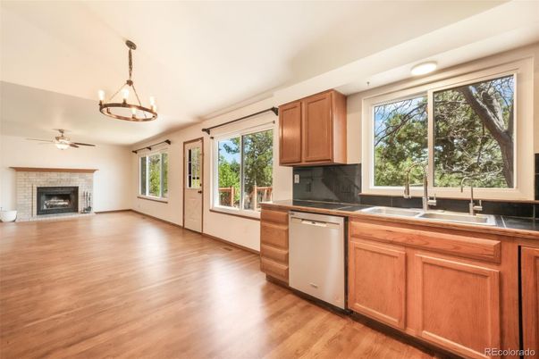 Fireplace, Interior, Kitchen, Pendant Lights, Recessed Lighting, Wood Texture Flooring