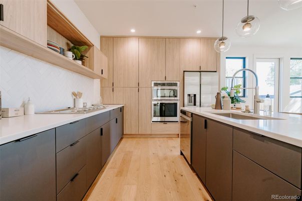 Interior, Kitchen, Pendant Lights, Recessed Lighting, Stainless Steel Appliances, Wood Texture Flooring