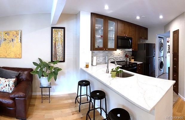 Interior, Kitchen, Recessed Lighting, Washer, Wood Texture Flooring