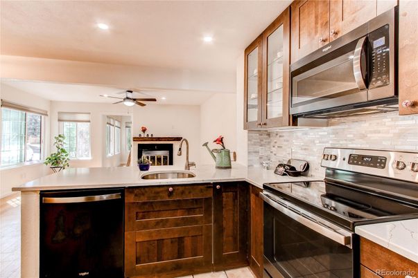 Fireplace, Interior, Kitchen, Recessed Lighting, Stainless Steel Appliances