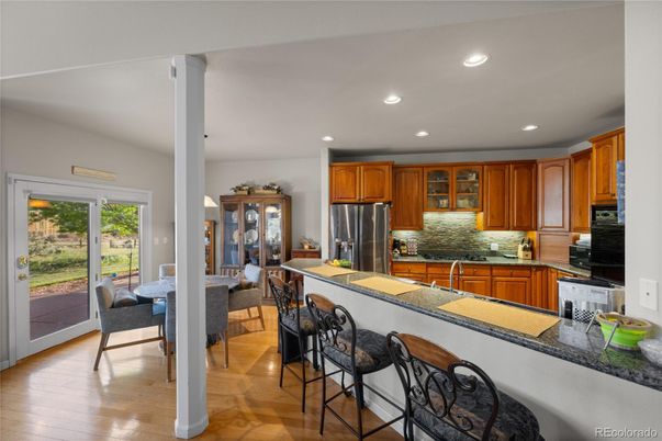 Dining room, Interior, Kitchen, Recessed Lighting, Stainless Steel Appliances, Wood Texture Flooring