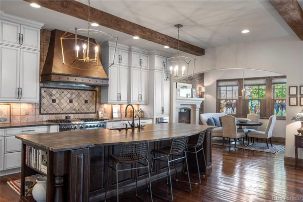 Dining room, Fireplace, Interior, Kitchen, Pendant Lights, Recessed Lighting, Stainless Steel Appliances, Wooden Beams, Wood Texture Flooring