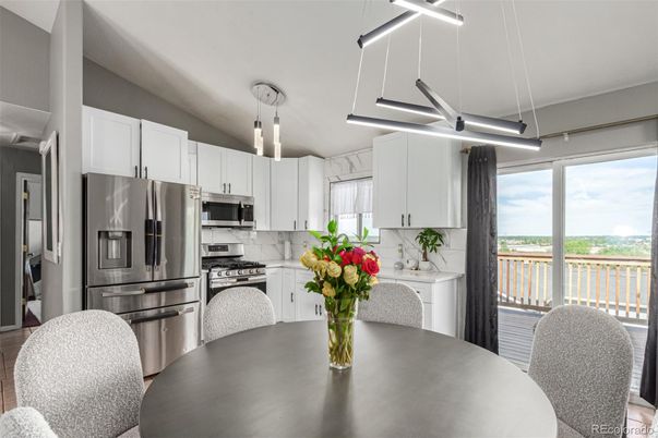 Dining room, Interior, Kitchen, Pendant Lights, Stainless Steel Appliances, Wood Texture Flooring
