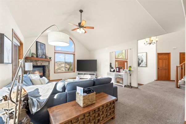 Chandelier, Fireplace, Interior, Living room