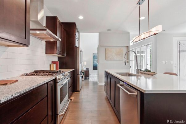 Interior, Kitchen, Pendant Lights, Recessed Lighting, Stainless Steel Appliances, Wood Texture Flooring