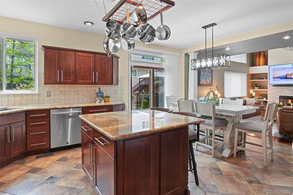 Dining room, Fireplace, Interior, Kitchen, Pendant Lights, Recessed Lighting, Stainless Steel Appliances