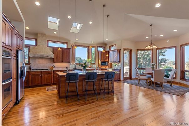Dining room, Interior, Kitchen, Pendant Lights, Recessed Lighting, Stainless Steel Appliances, Wood Texture Flooring