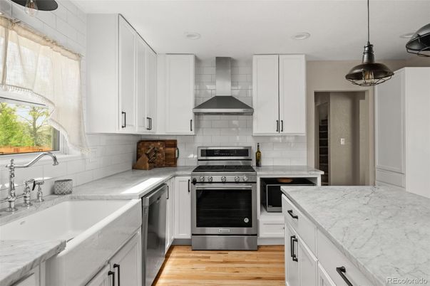 Interior, Kitchen, Pendant Lights, Recessed Lighting, Stainless Steel Appliances, Wood Texture Flooring