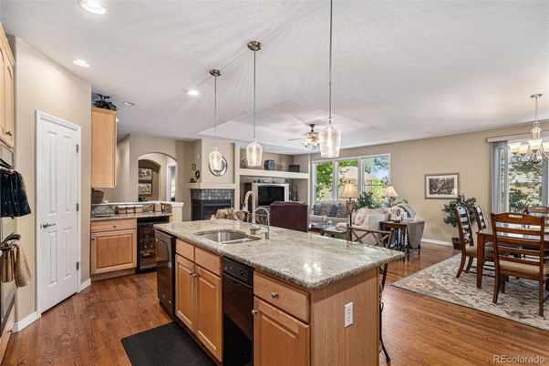 Chandelier, Dining room, Fireplace, Interior, Kitchen, Living room, Pendant Lights, Recessed Lighting, Wood Texture Flooring