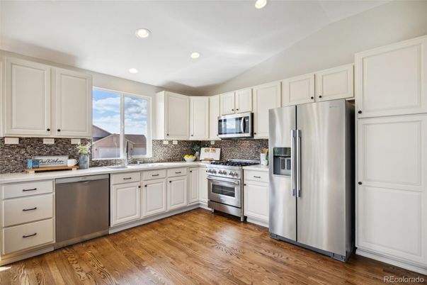 Interior, Kitchen, Recessed Lighting, Stainless Steel Appliances, Wood Texture Flooring