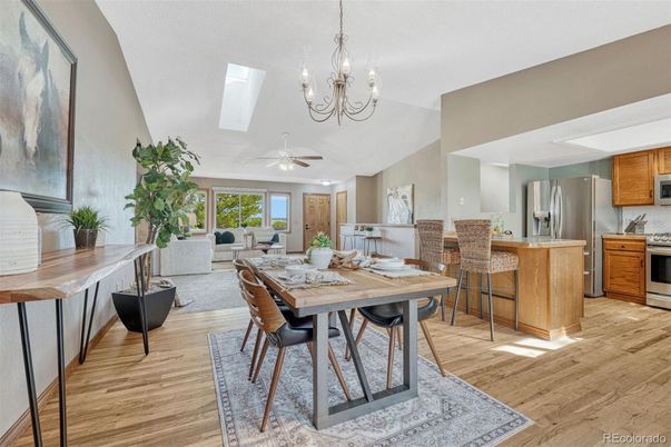 Chandelier, Dining room, Interior, Kitchen, Living room, Stainless Steel Appliances, Wood Texture Flooring