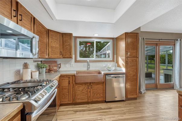 Interior, Kitchen, Recessed Lighting, Stainless Steel Appliances, Wood Texture Flooring