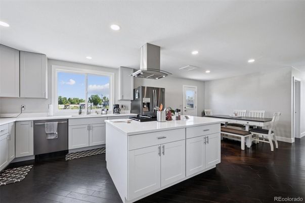 Dining room, Interior, Kitchen, Recessed Lighting, Stainless Steel Appliances, Wood Texture Flooring
