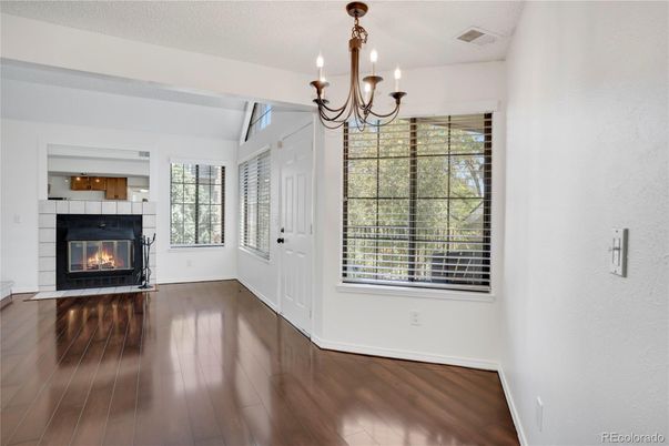 Chandelier, Empty room, Fireplace, Interior, Wood Texture Flooring