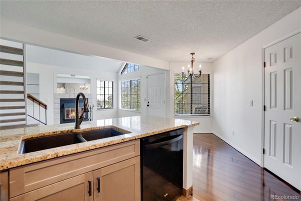 Chandelier, Fireplace, Interior, Kitchen, Wood Texture Flooring