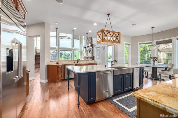Dining room, Interior, Kitchen, Pendant Lights, Recessed Lighting, Stainless Steel Appliances, Wood Texture Flooring