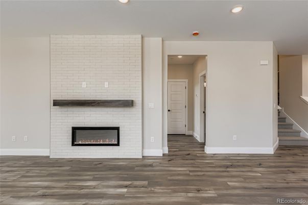 Empty room, Fireplace, Interior, Recessed Lighting, Wood Texture Flooring