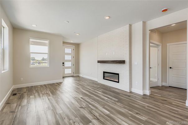 Empty room, Fireplace, Interior, Recessed Lighting, Wood Texture Flooring