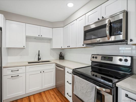 Interior, Kitchen, Recessed Lighting, Stainless Steel Appliances, Wood Texture Flooring