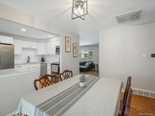 Dining room, Interior, Kitchen, Recessed Lighting, Stainless Steel Appliances, Wood Texture Flooring