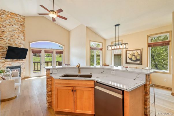 Fireplace, Interior, Kitchen, Pendant Lights, Stone Walls, Wood Texture Flooring