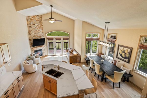 Dining room, Fireplace, Interior, Living room, Pendant Lights, Stone Walls, Wood Texture Flooring