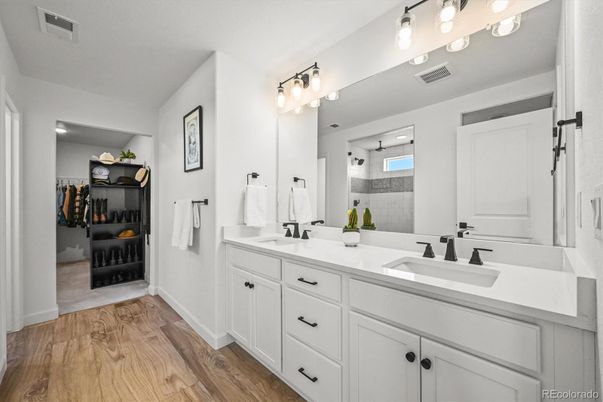 Bathroom, Dual Sink Vanities, Interior, Walk-in Closets, Wood Texture Flooring