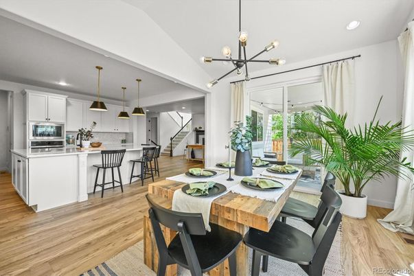 Dining room, Interior, Kitchen, Pendant Lights, Recessed Lighting, Stainless Steel Appliances, Wood Texture Flooring