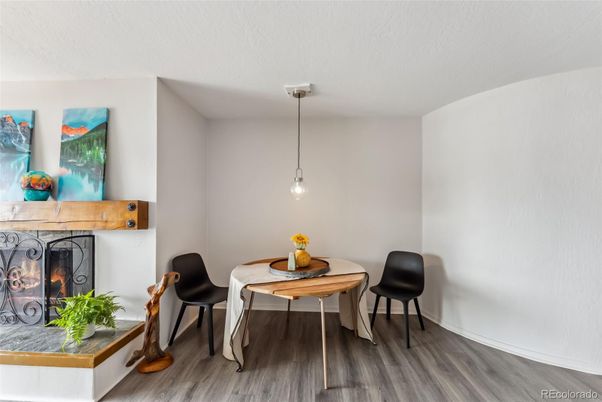 Dining room, Fireplace, Interior, Pendant Lights, Wood Texture Flooring