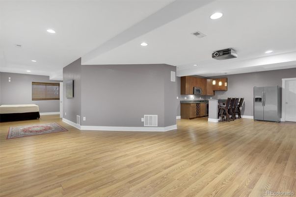 Dining room, Interior, Kitchen, Pendant Lights, Recessed Lighting, Stainless Steel Appliances, Wood Texture Flooring