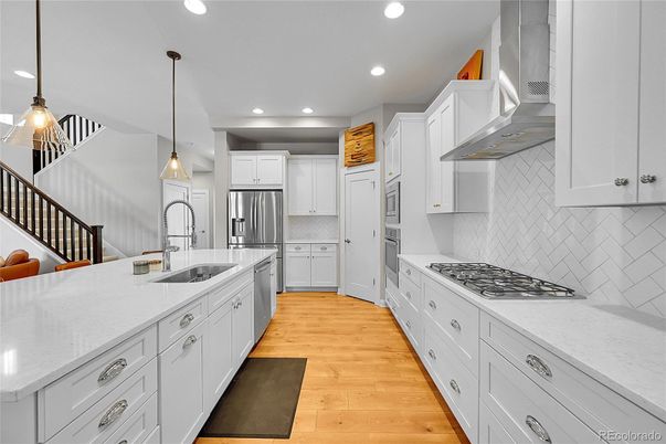 Interior, Kitchen, Pendant Lights, Recessed Lighting, Stainless Steel Appliances, Wood Texture Flooring