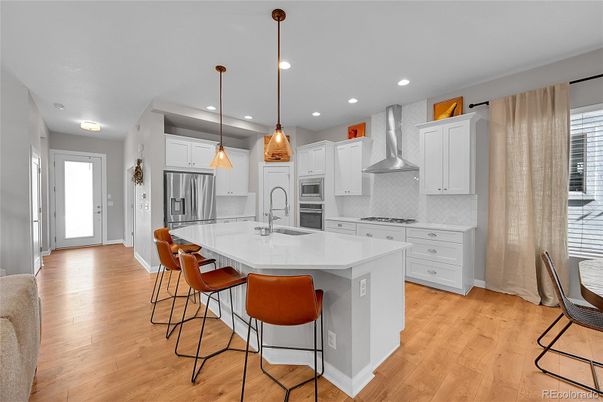 Interior, Kitchen, Pendant Lights, Recessed Lighting, Stainless Steel Appliances, Wood Texture Flooring