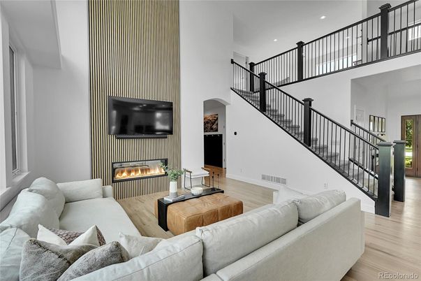 Fireplace, Interior, Living room, Recessed Lighting, Wood Texture Flooring