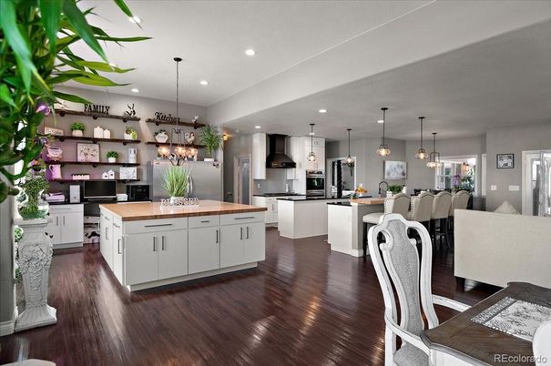 Dining room, Interior, Kitchen, Pendant Lights, Recessed Lighting, Stainless Steel Appliances, Wood Texture Flooring