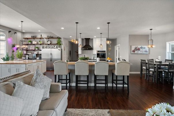 Dining room, Interior, Kitchen, Pendant Lights, Recessed Lighting, Stainless Steel Appliances, Wood Texture Flooring