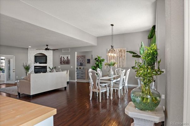 Dining room, Fireplace, Interior, Living room, Pendant Lights, Recessed Lighting, Wood Texture Flooring