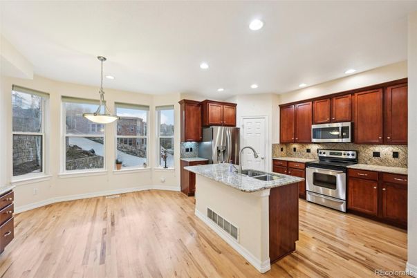 Interior, Kitchen, Pendant Lights, Recessed Lighting, Stainless Steel Appliances, Wood Texture Flooring