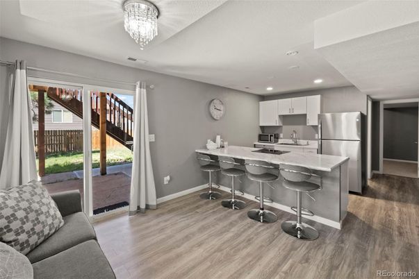 Chandelier, Interior, Kitchen, Recessed Lighting, Stainless Steel Appliances, Wood Texture Flooring