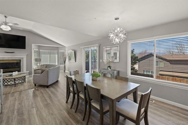 Chandelier, Dining room, Fireplace, Interior, Living room, Pendant Lights, Wood Texture Flooring