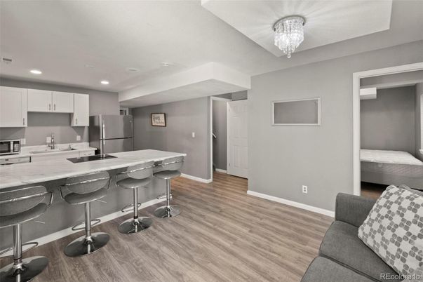 Chandelier, Interior, Kitchen, Recessed Lighting, Stainless Steel Appliances, Wood Texture Flooring